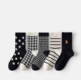 Elevate your wardrobe essentials with the Caramella Sock Black Series 2. 