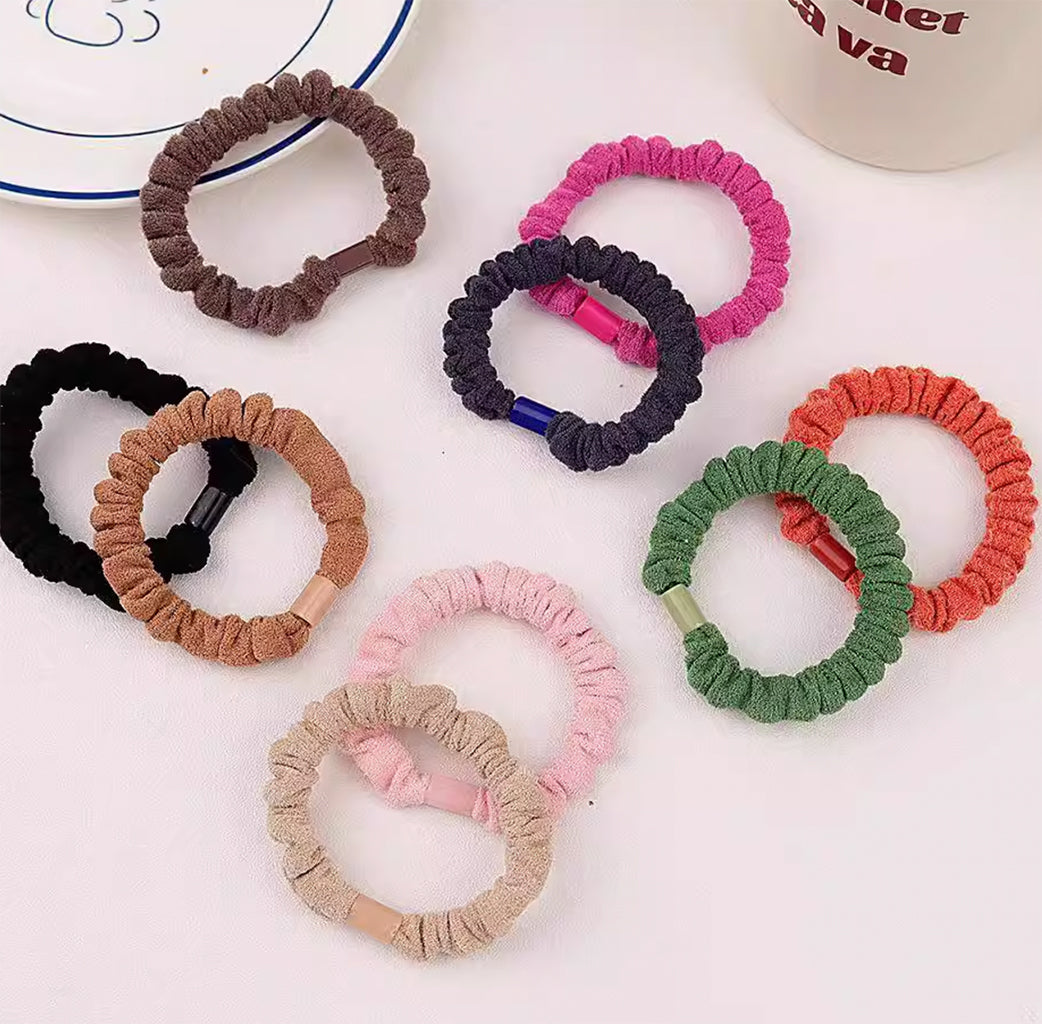 Keep cozy and stylish with these Woolen Knitted Scrunchies Hair Ties. 